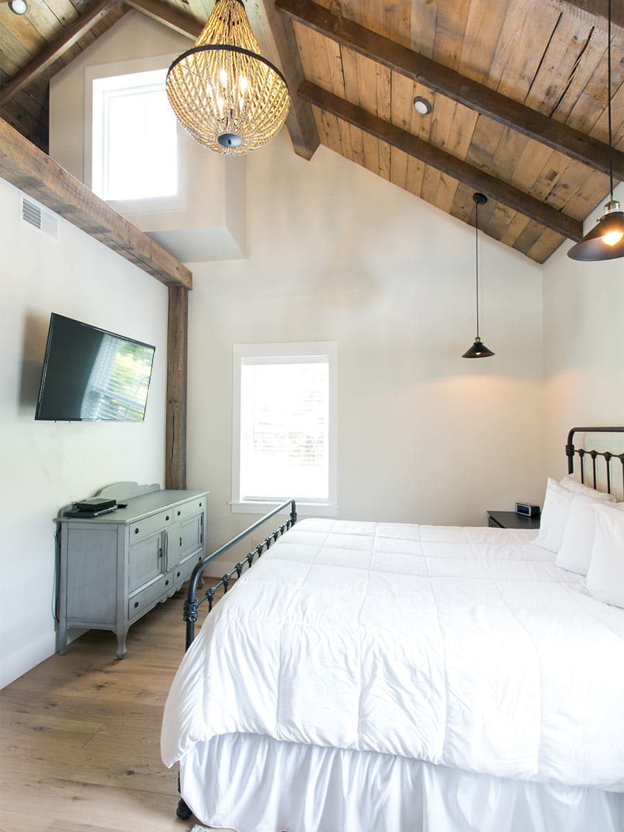 Bedroom with unique chandelier