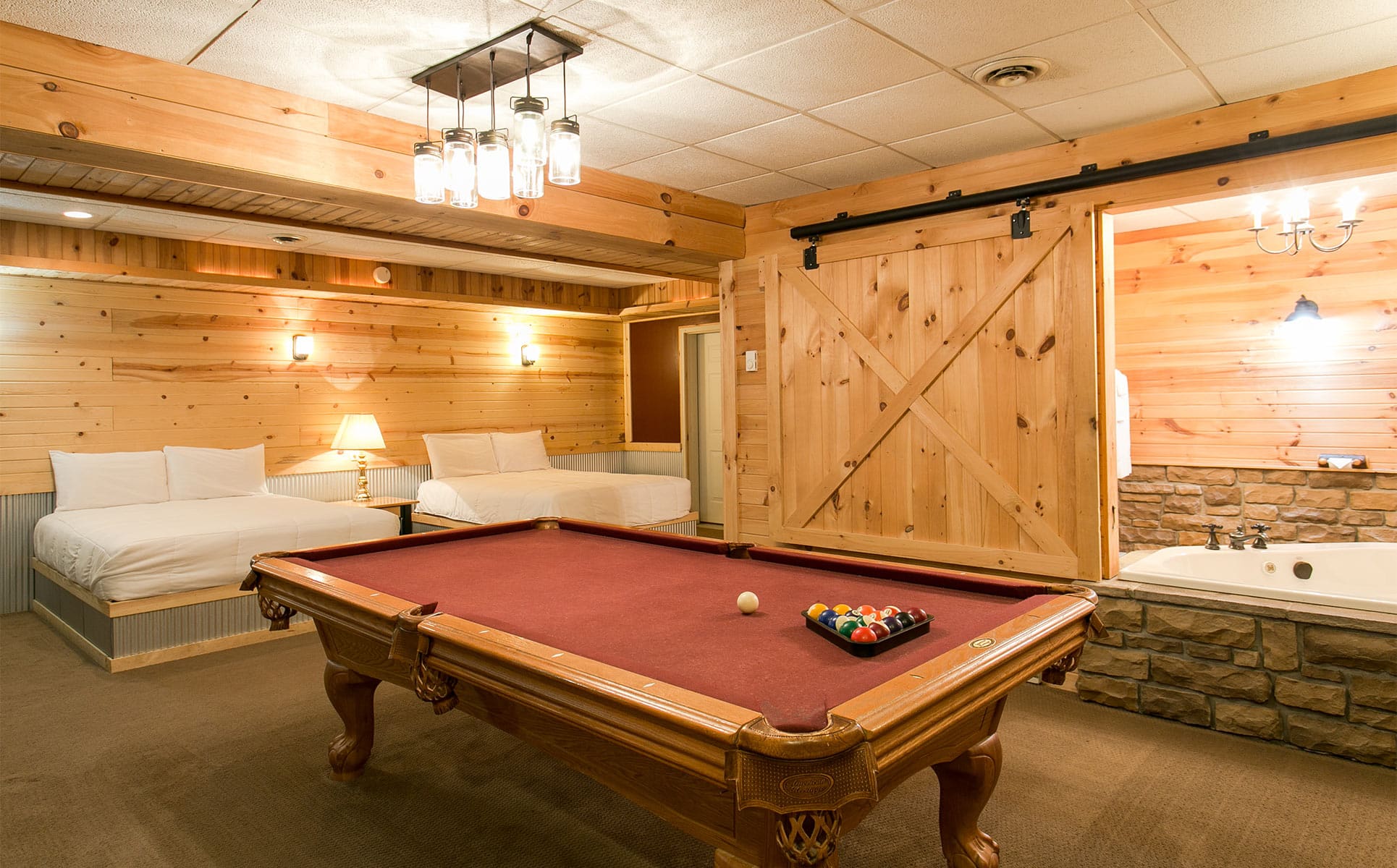 Pool Table with beds in basement