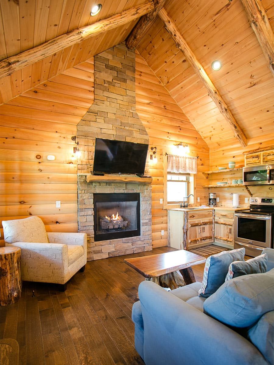 stone fireplace with vaulted ceiling