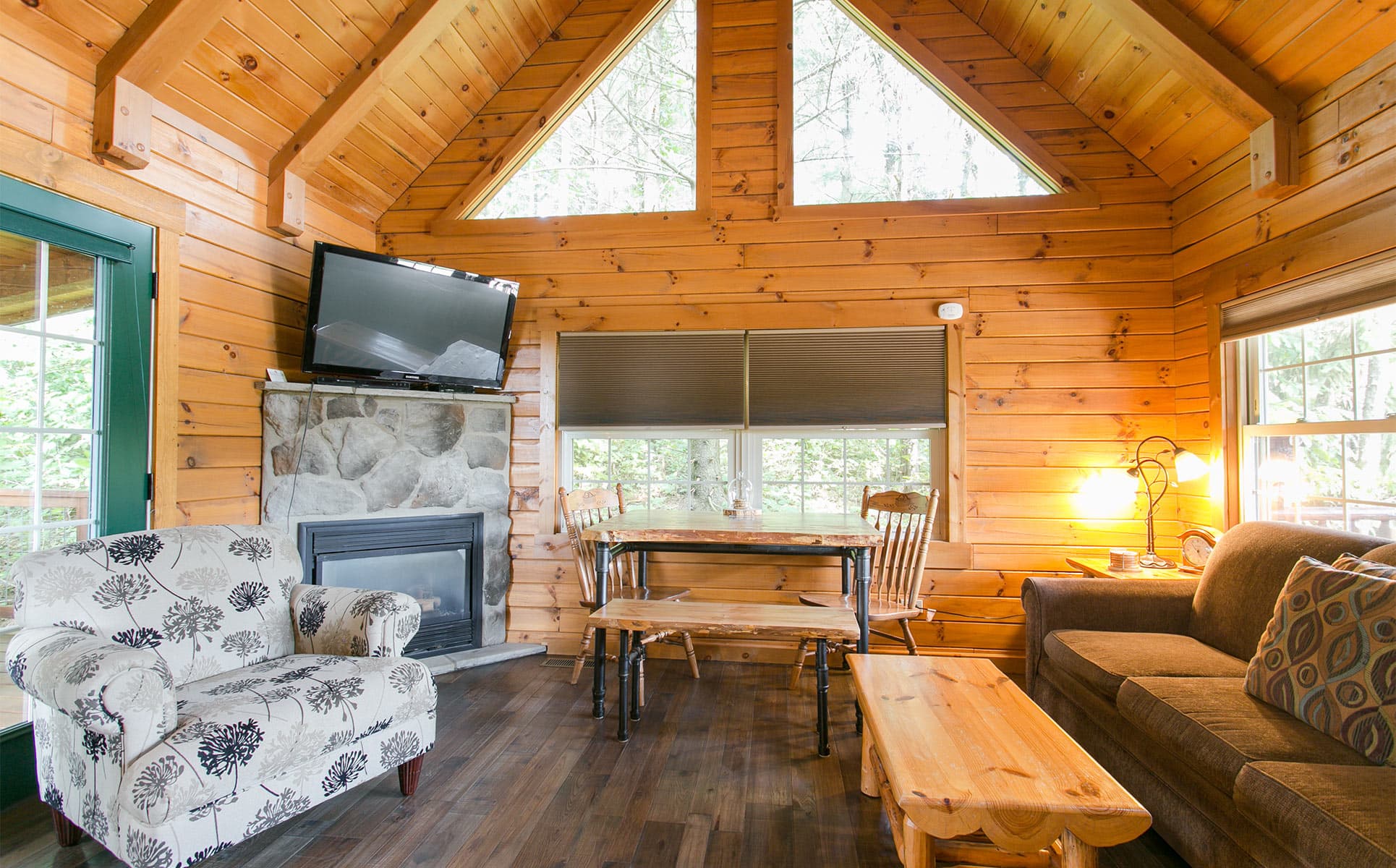 Living Room with couch, chair, tv, and table