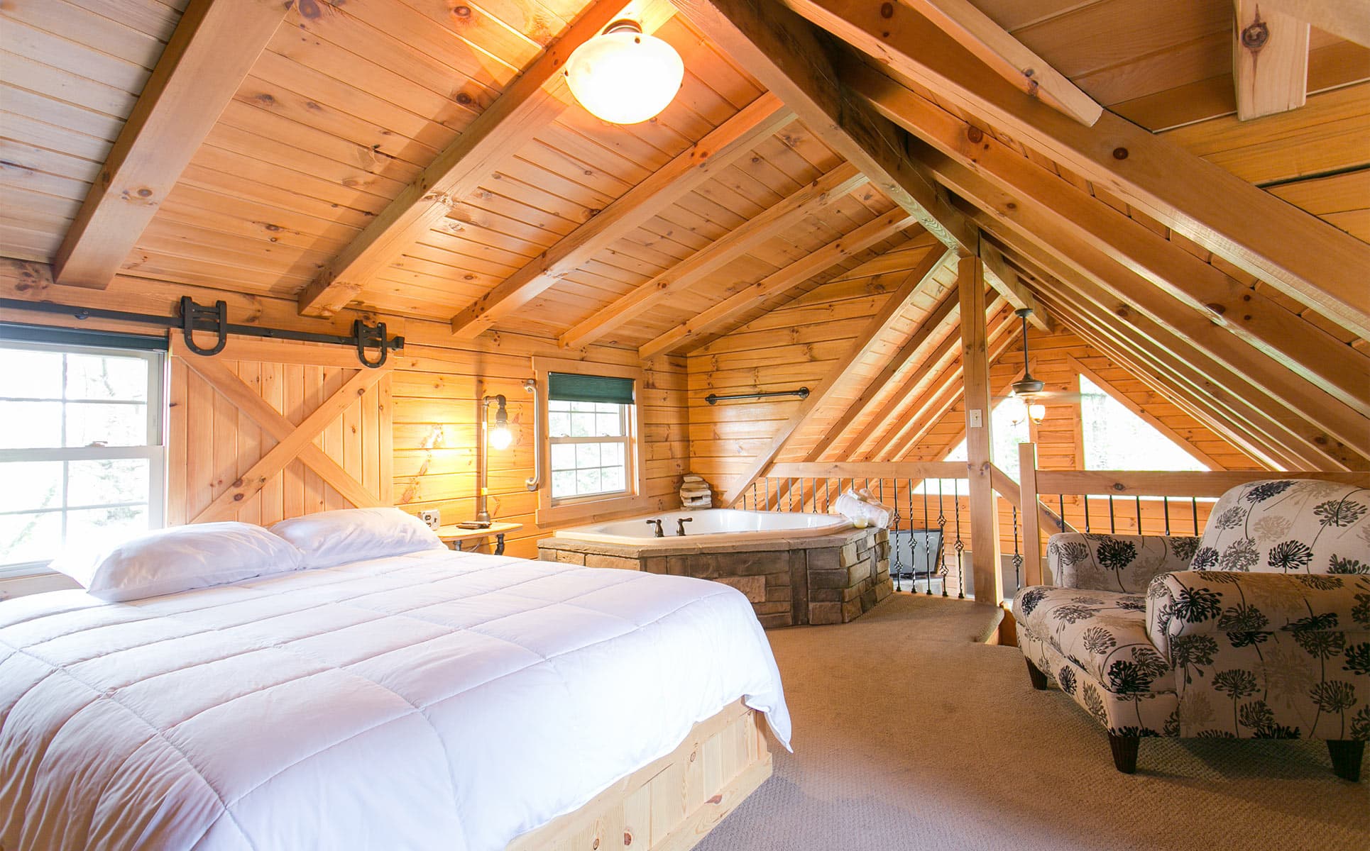 Loft with bed and two-person jetted tub