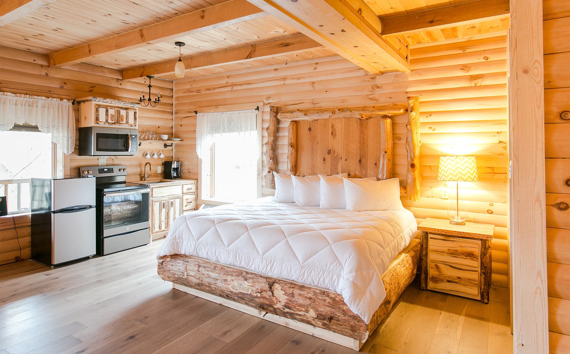 King Bed with Kitchen in background