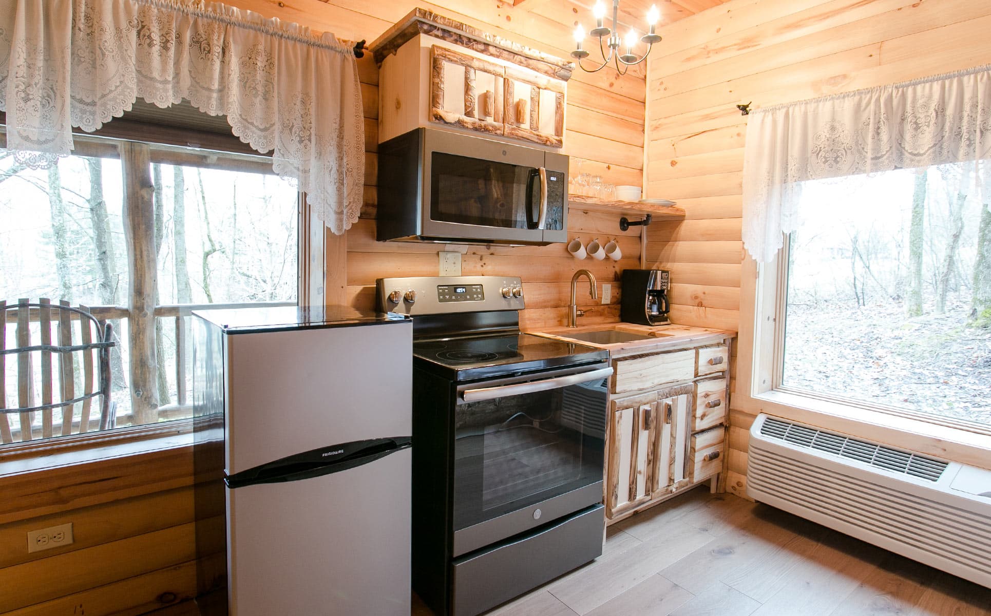 Kitchen with range, micro, and fridge