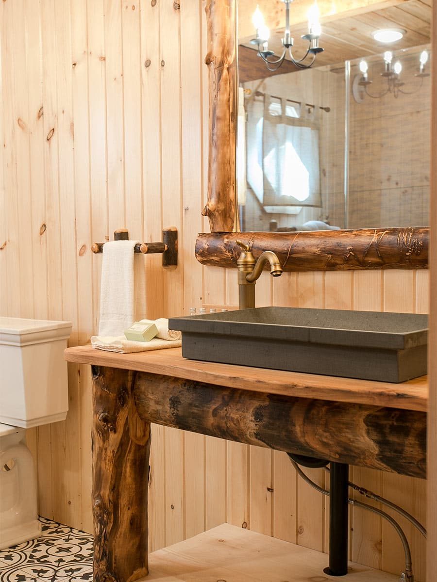 Bathroom with wood vanity and vesell sink