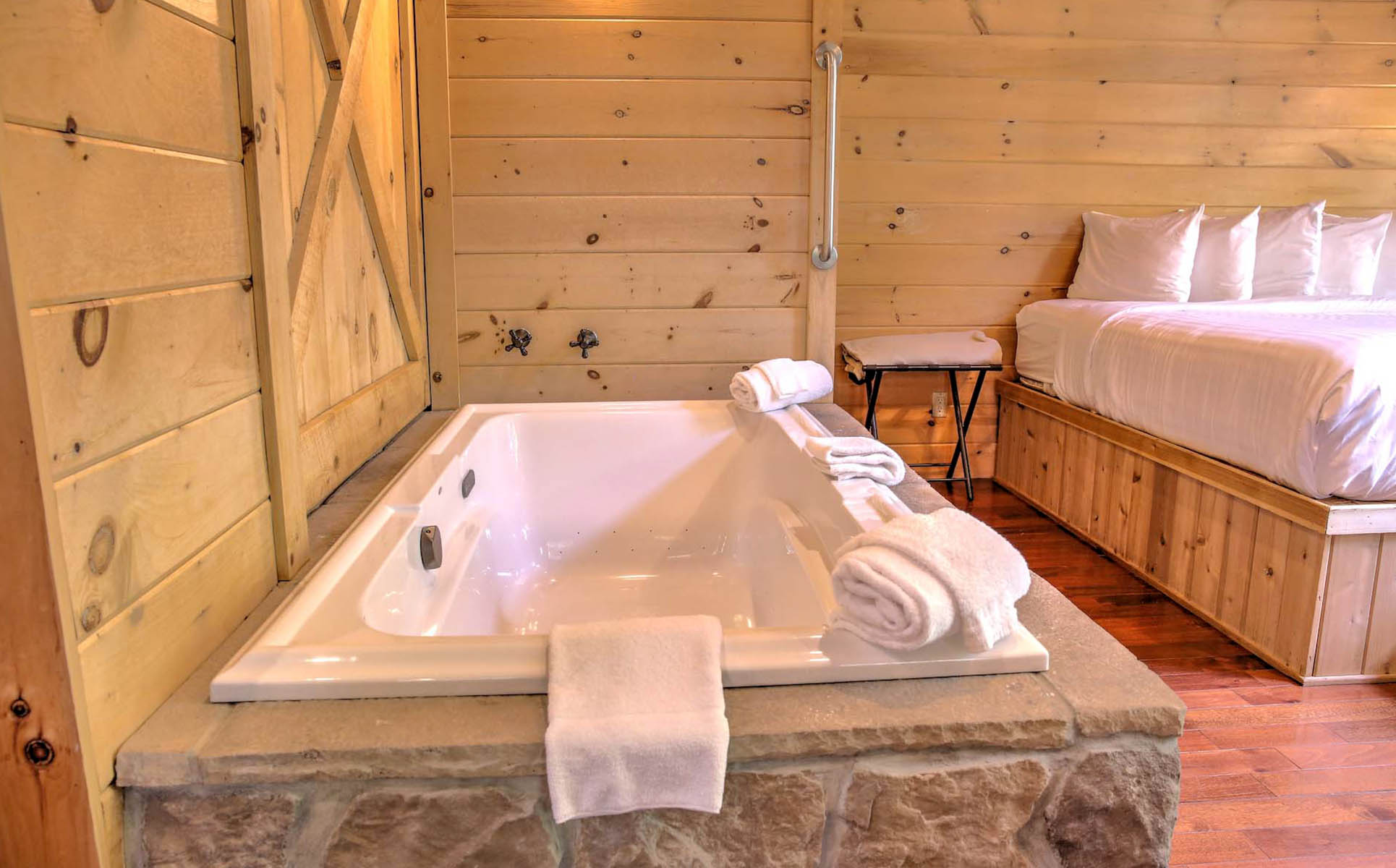 Stone two-person jetted tub