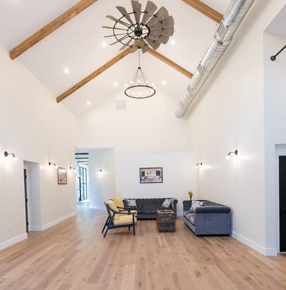 Common Area with couches and chairs in Farmhouse