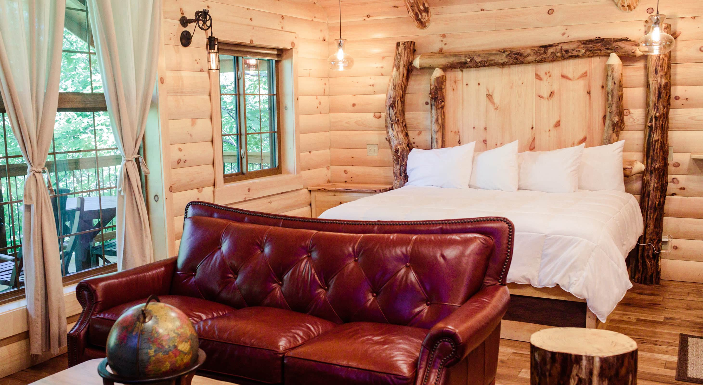 Bed and Red Couch in Treehouse F