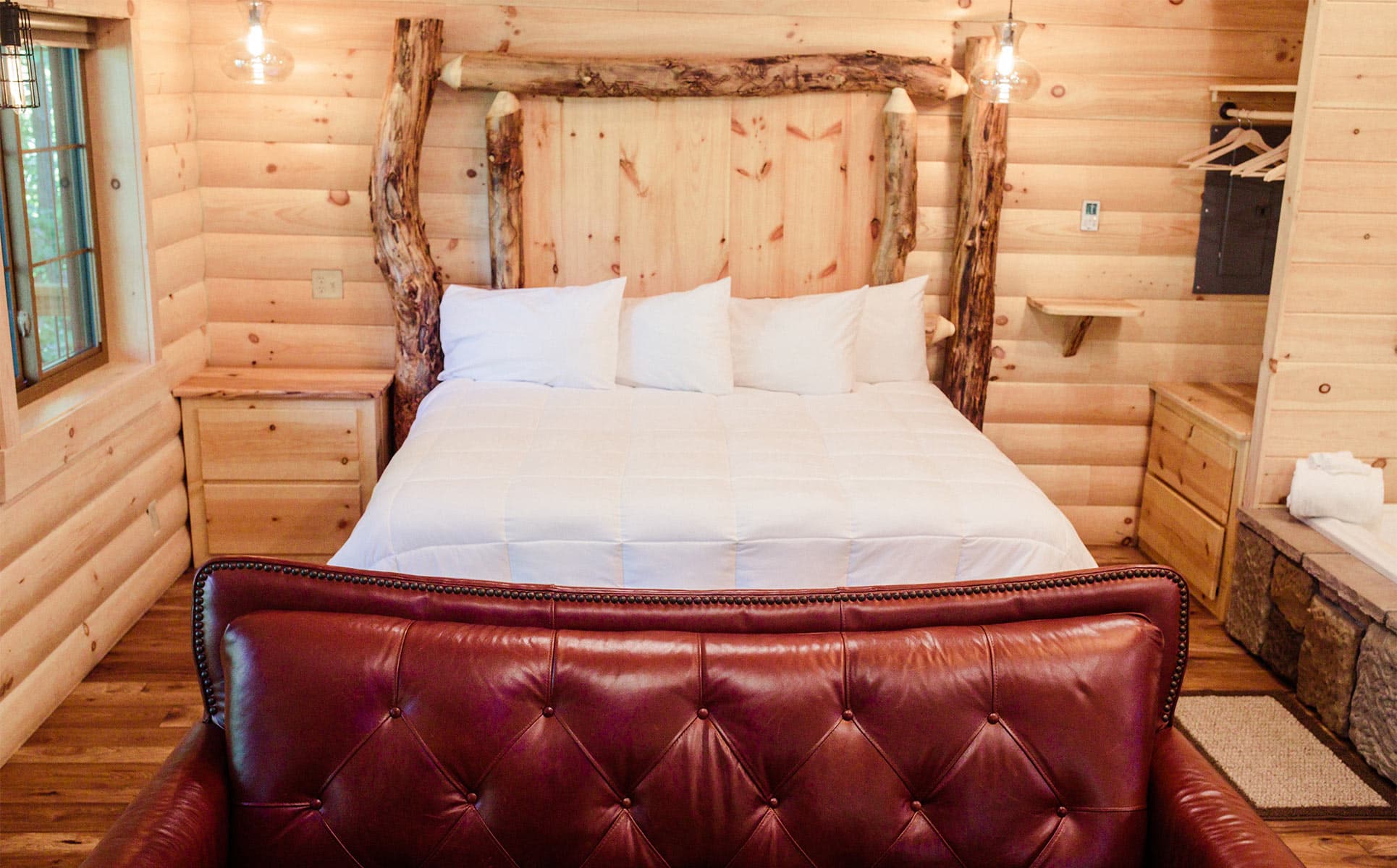 Bed and Red Couch in Treehouse #4