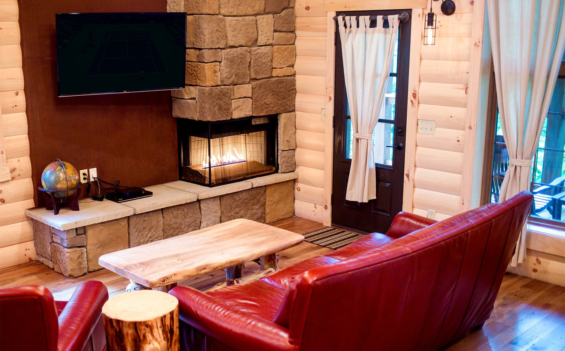 Living room with fireplace and television