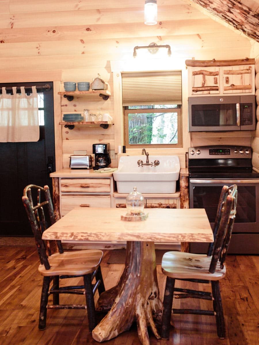 Kitchen with dining table and two chairs