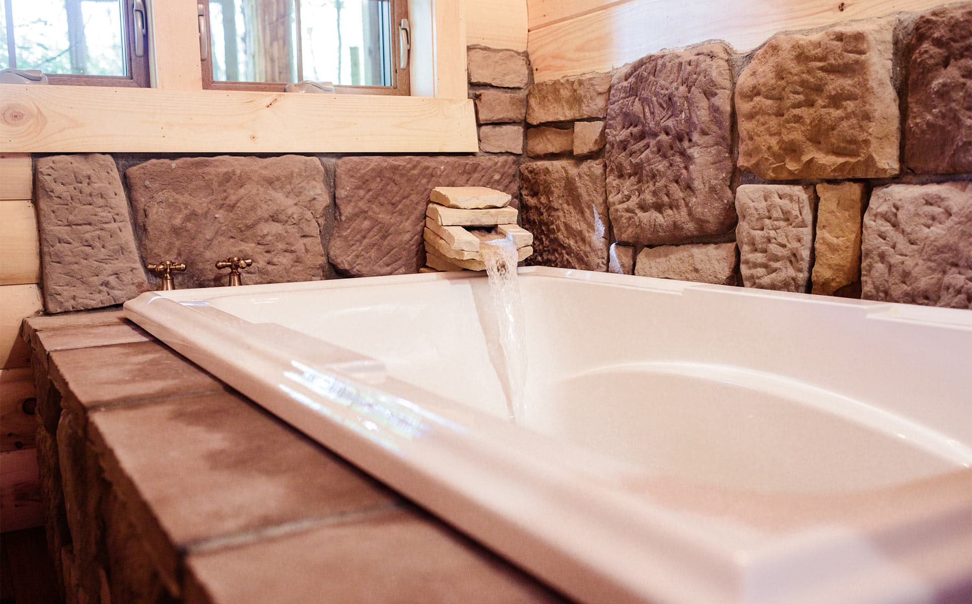 Jetted Tub with Waterfall Faucet