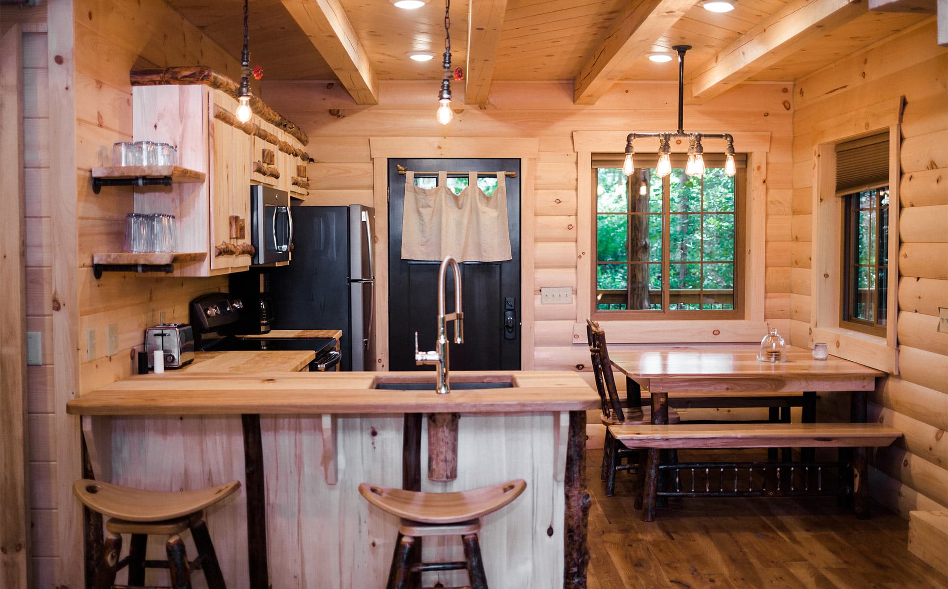 Full kitchen with dining room table