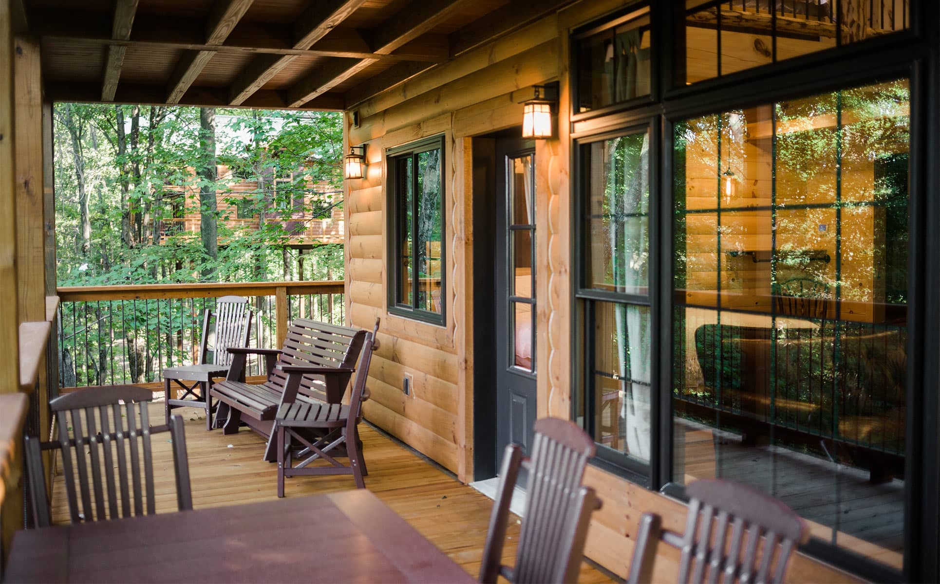 Main exterior deck with chairs and table