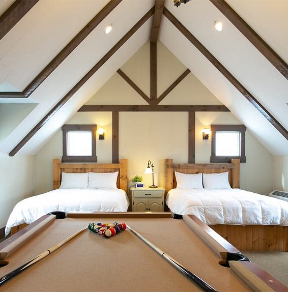 Two Beds with a pool table